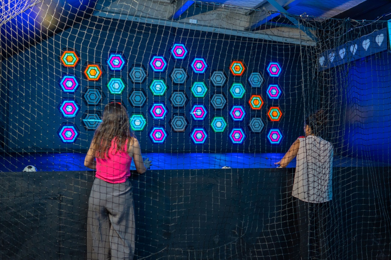 People immersed in VS ARENA entertainment room