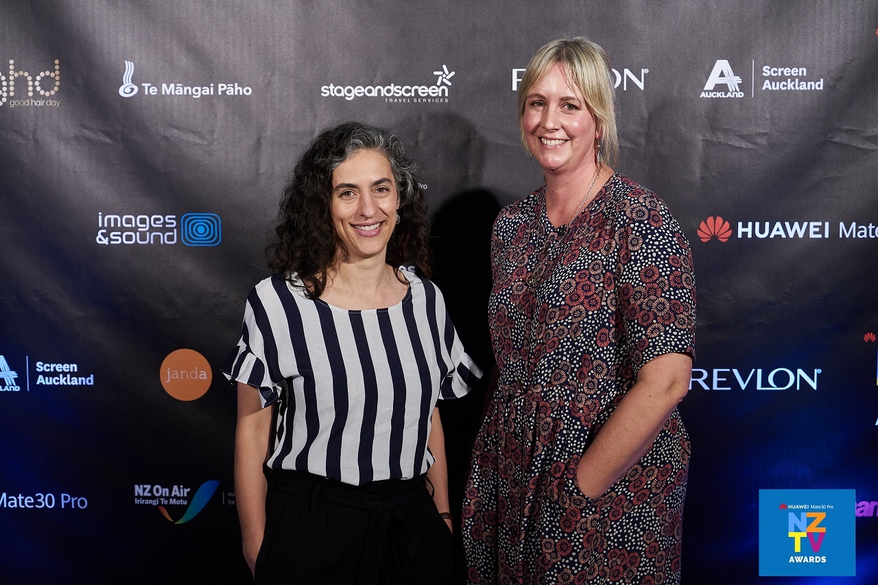 Jasmine Millet, Manager Screen Auckland (left) congratulates Britta Hawkins, Producer, ‘Fresh Eggs’
