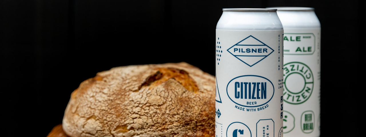 fresh baked bread and two cans of beer