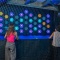 People immersed in VS ARENA entertainment room
