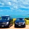 Two black Mercedes Benz vans - Ananda Tours
