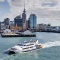 A Fullers Ferry comes out of the Downtown Ferry Terminal on Auckland's waterfront 