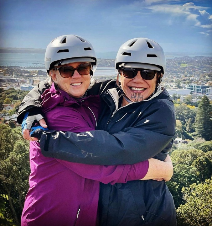 Smiling atop Mt Eden