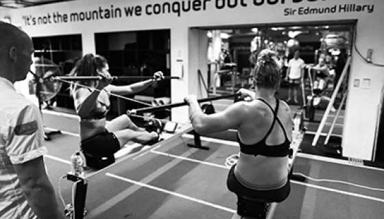 Sports people training in gym